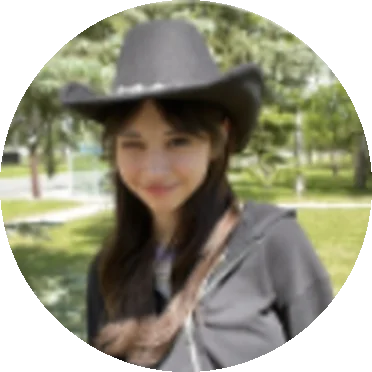 Andrea in a cowboy hat, from her AER story thumbnail